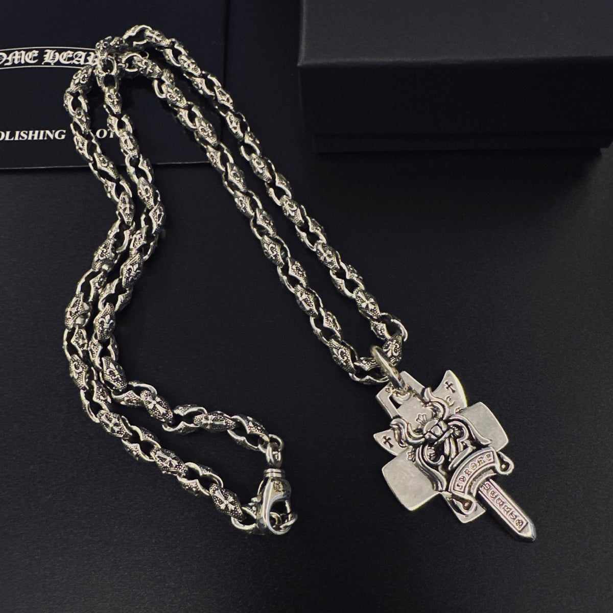 Martin Graham pendant necklace in polished metal-tone – side detail