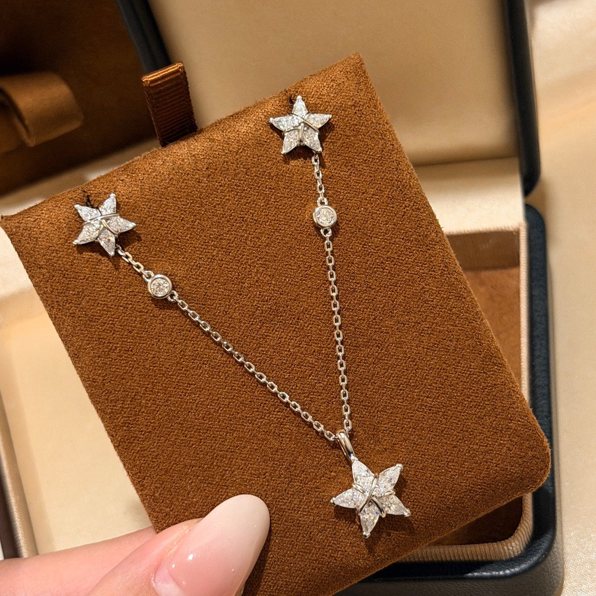 Martin Graham pendant necklace in polished metal-tone – side detail