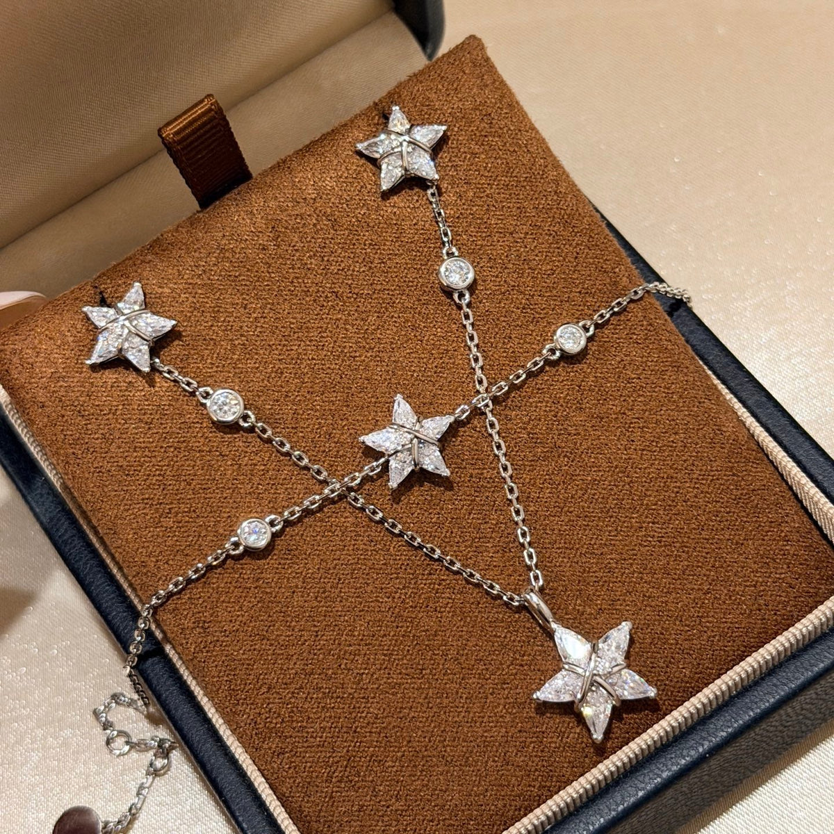 Martin Graham pendant necklace in polished metal-tone – close-up detail