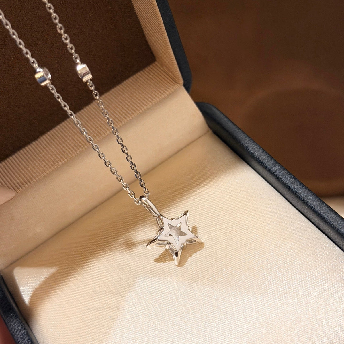 Martin Graham pendant necklace in polished metal-tone – front product view