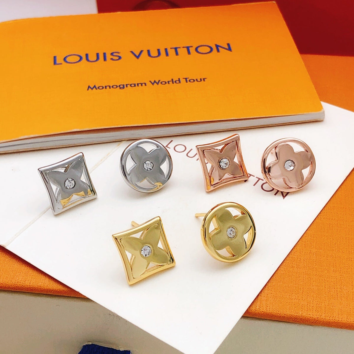 Martin Graham stud earrings in polished metal-tone – detail view