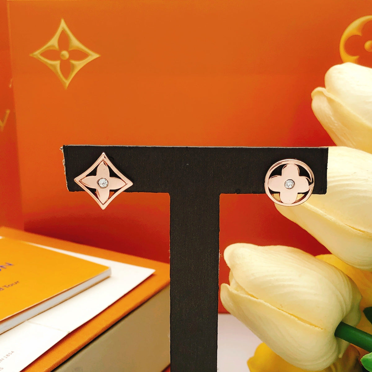 Martin Graham stud earrings in polished metal-tone – styled product view
