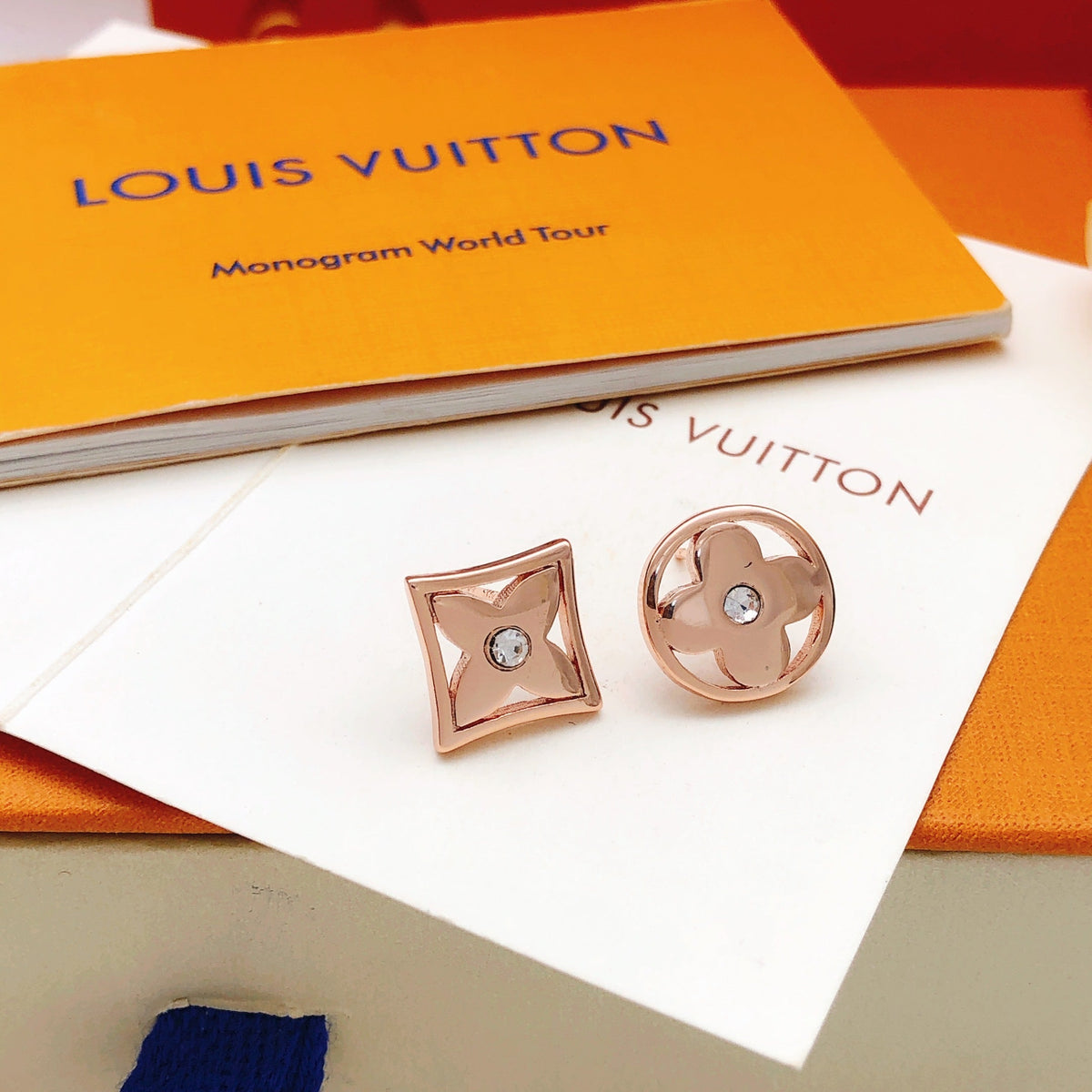 Martin Graham stud earrings in polished metal-tone – close-up detail