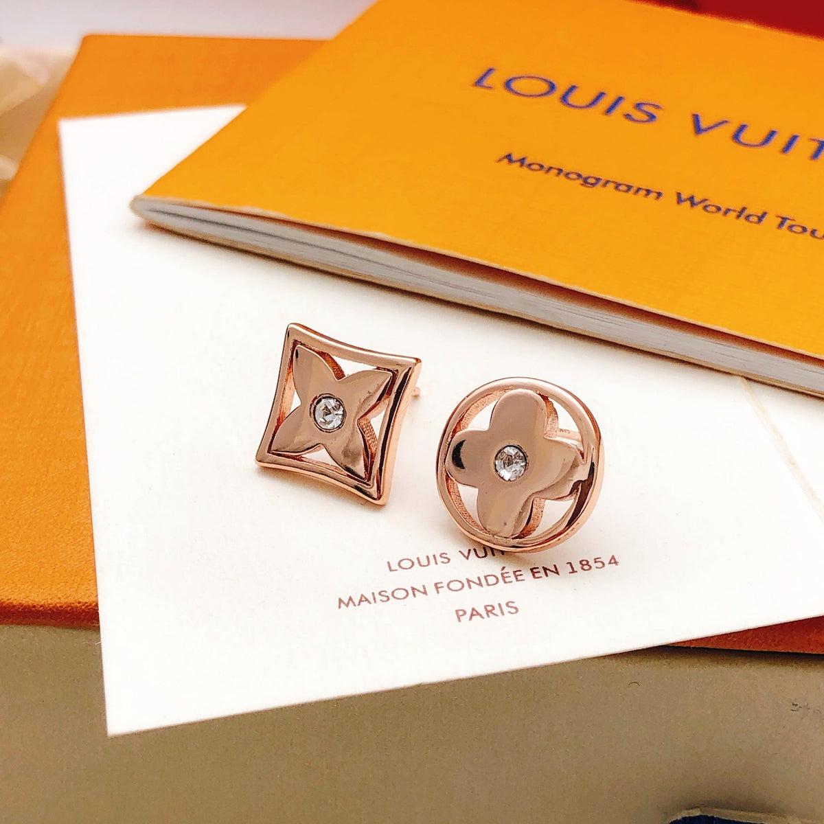 Martin Graham stud earrings in polished metal-tone – front product view