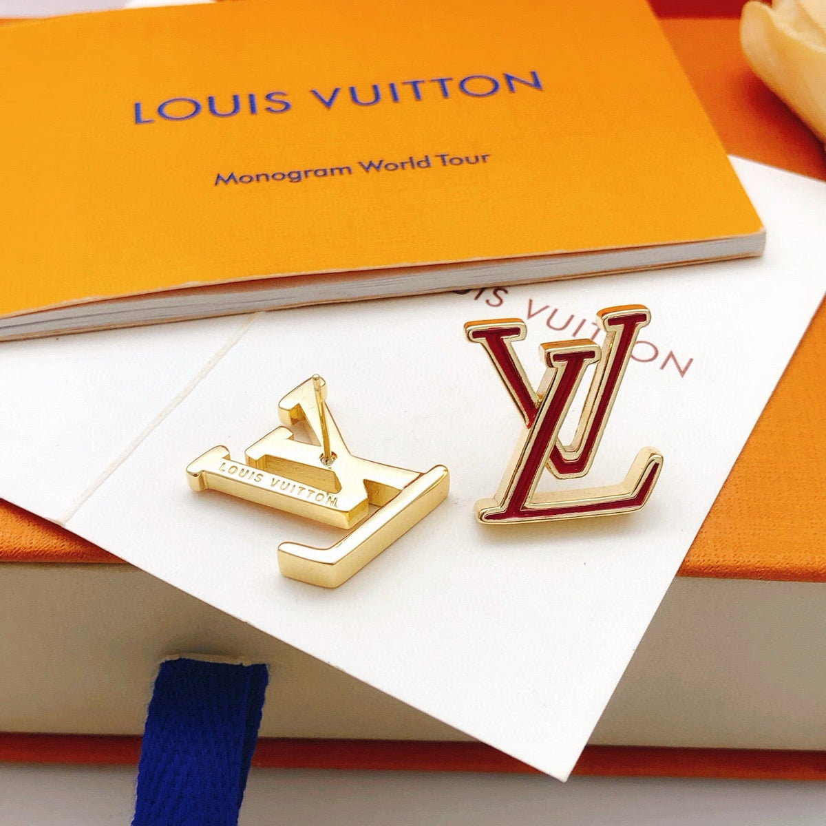 Martin Graham stud earrings in polished metal-tone – side detail