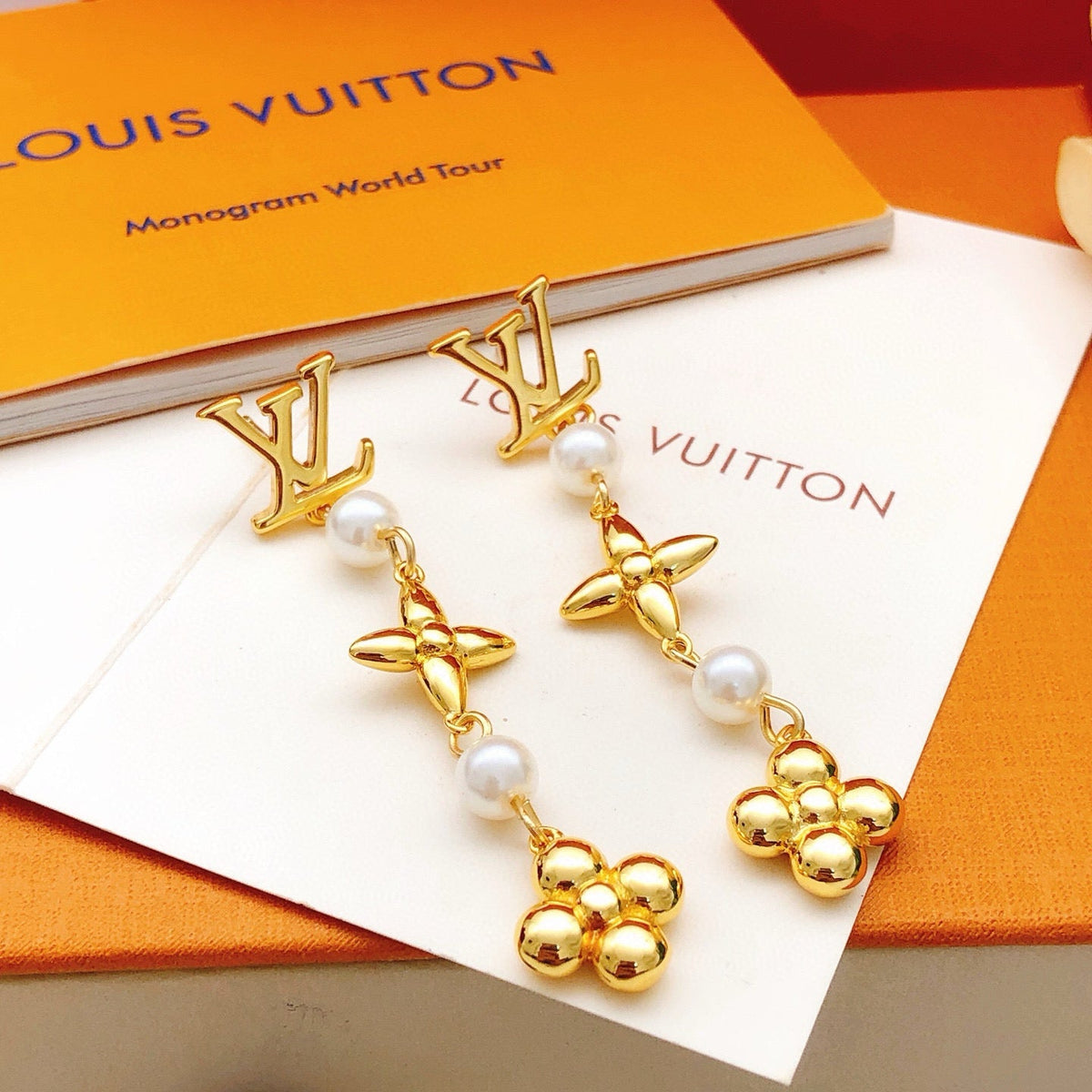Martin Graham stud earrings in polished metal-tone – front product view
