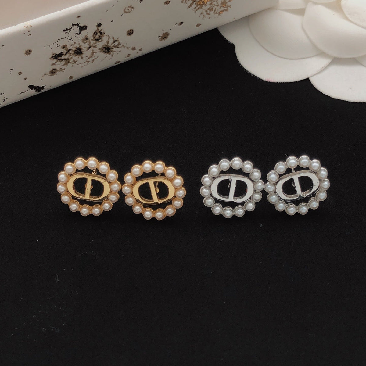Martin Graham stud earrings in polished metal-tone – main product view
