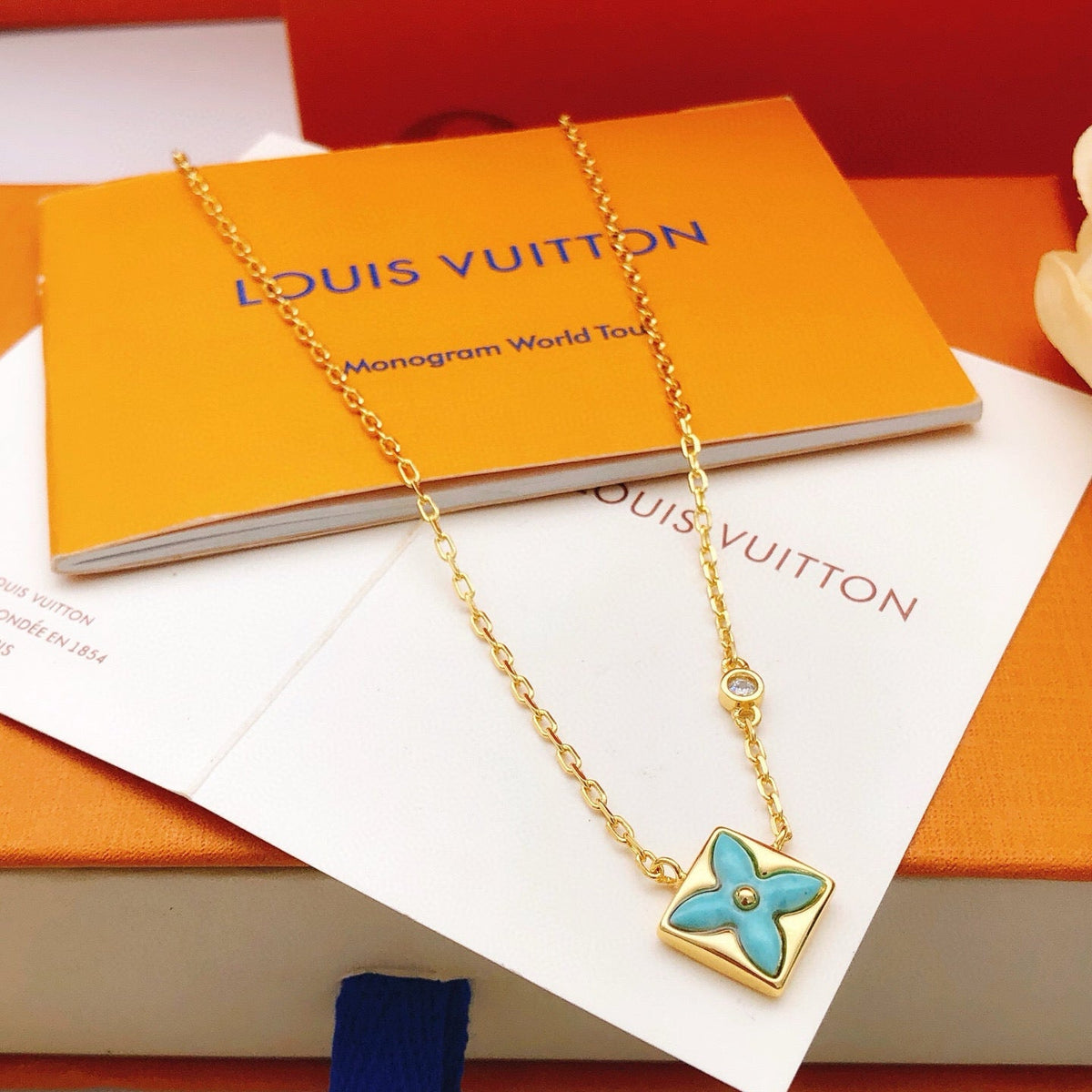 Martin Graham pendant necklace in polished metal-tone – close-up detail