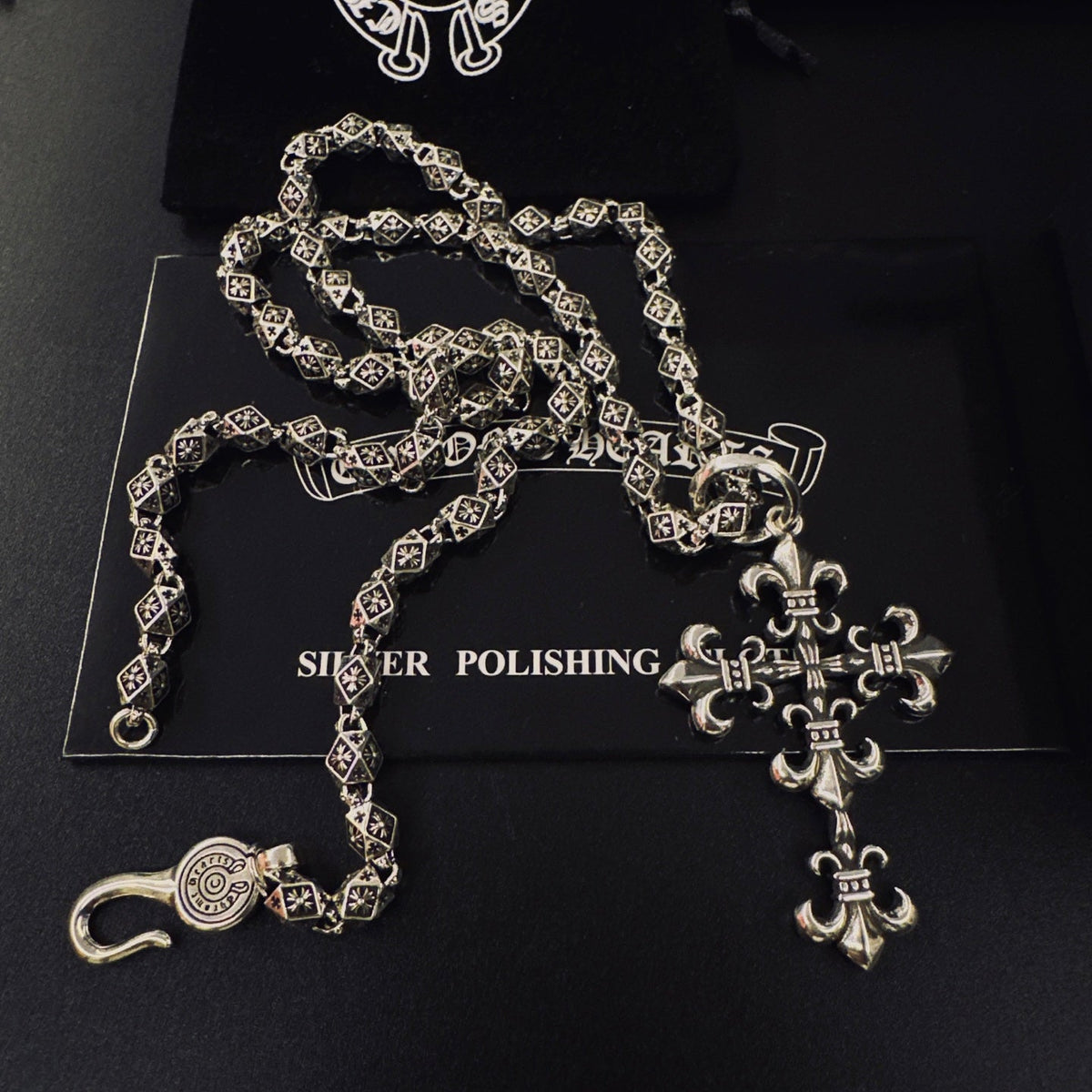 Martin Graham pendant necklace in polished metal-tone – close-up detail
