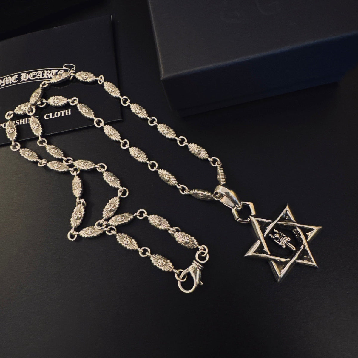 Martin Graham pendant necklace in polished metal-tone – detail view
