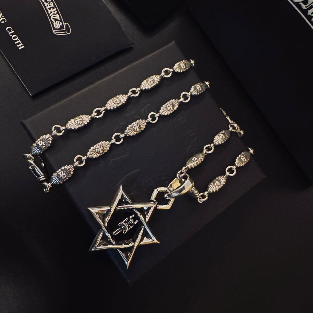 Martin Graham pendant necklace in polished metal-tone – styled product view
