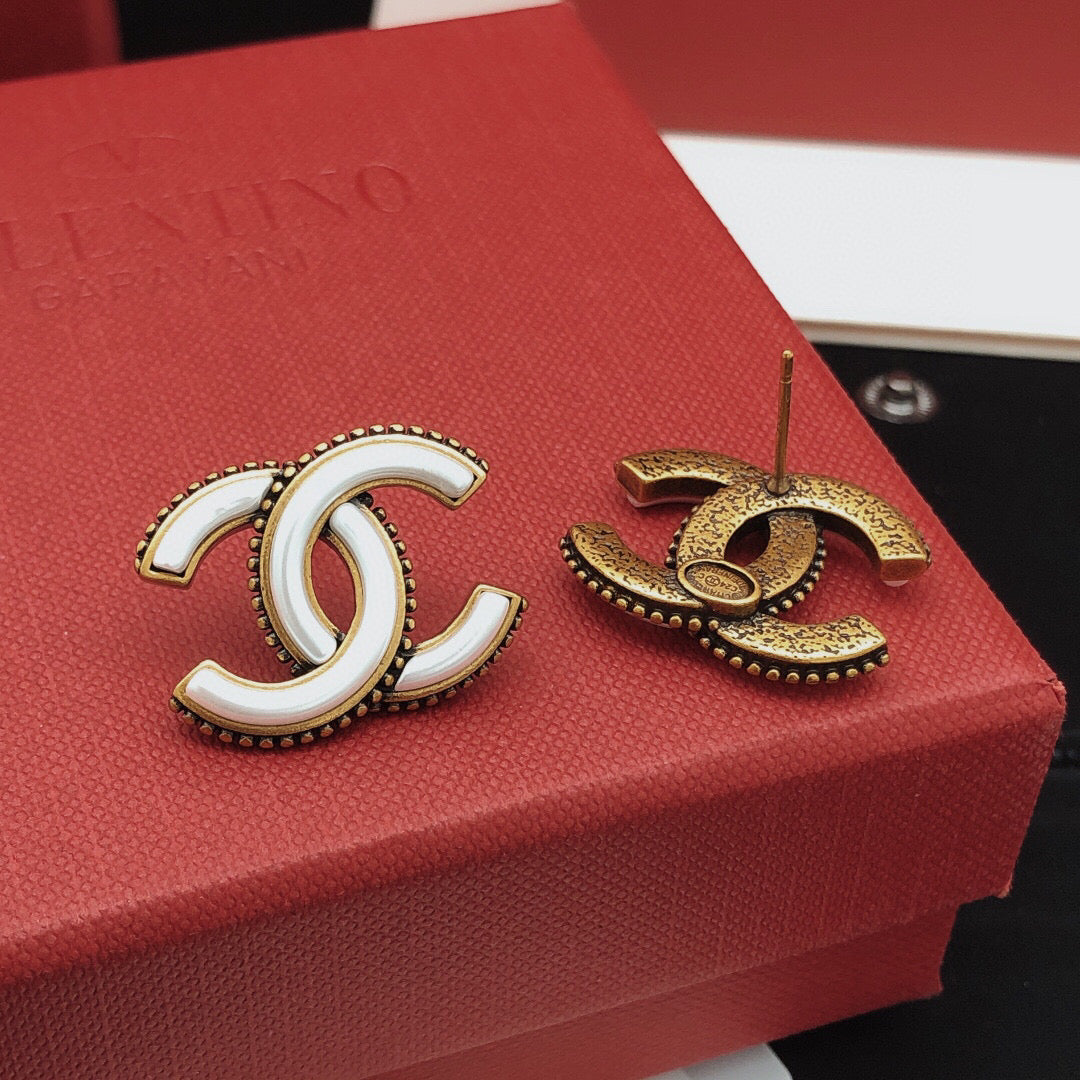 Martin Graham Double-C stud earrings in gold-tone – side detail