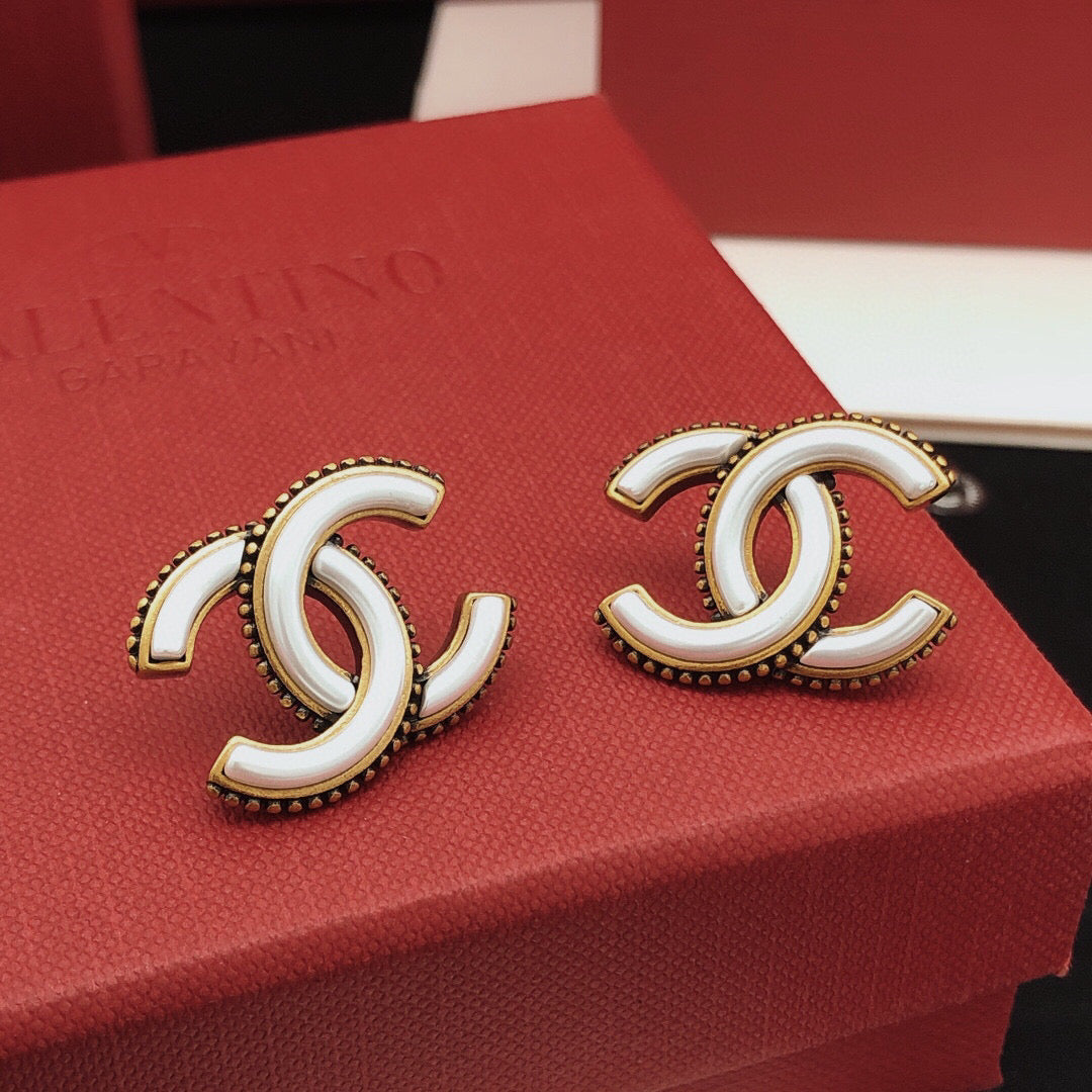 Martin Graham Double-C stud earrings in gold-tone – front product view