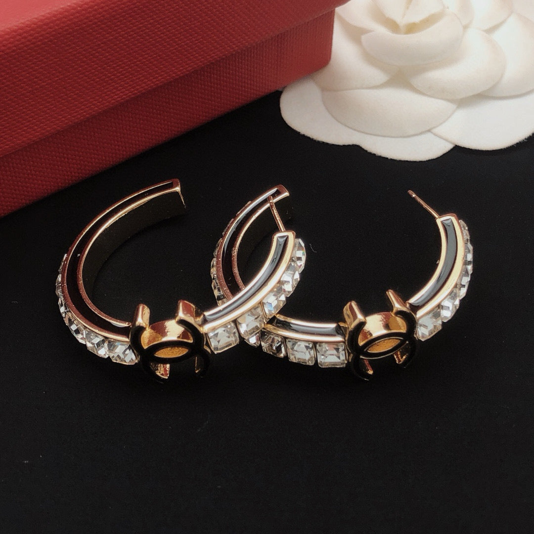 Martin Graham earrings in polished metal-tone – detail view