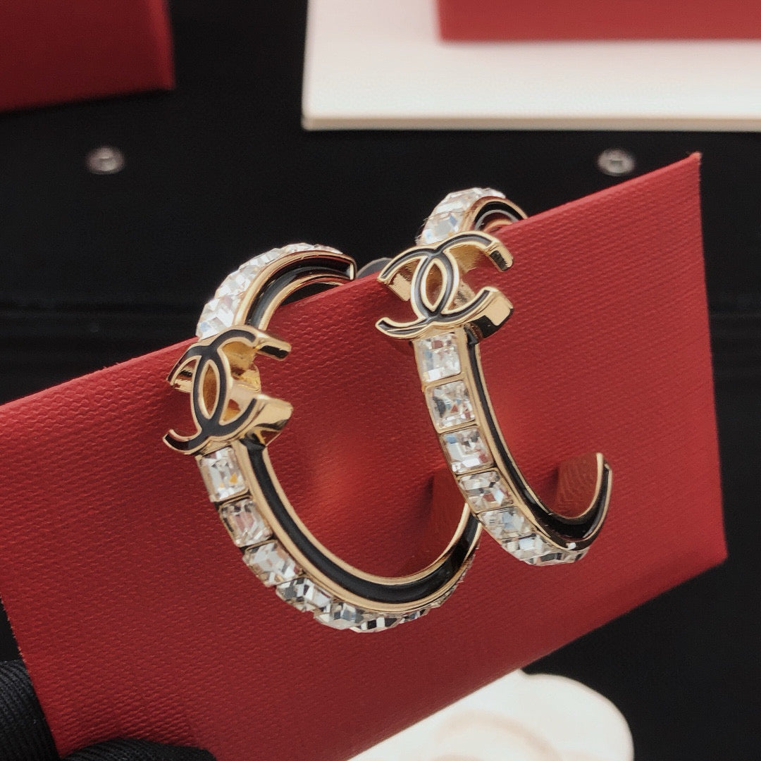 Martin Graham earrings in polished metal-tone – main product view