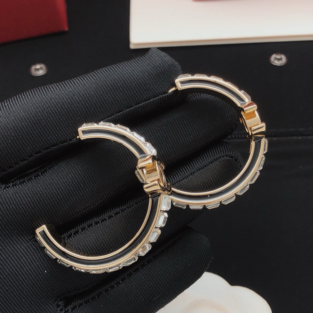 Martin Graham earrings in polished metal-tone – styled product view
