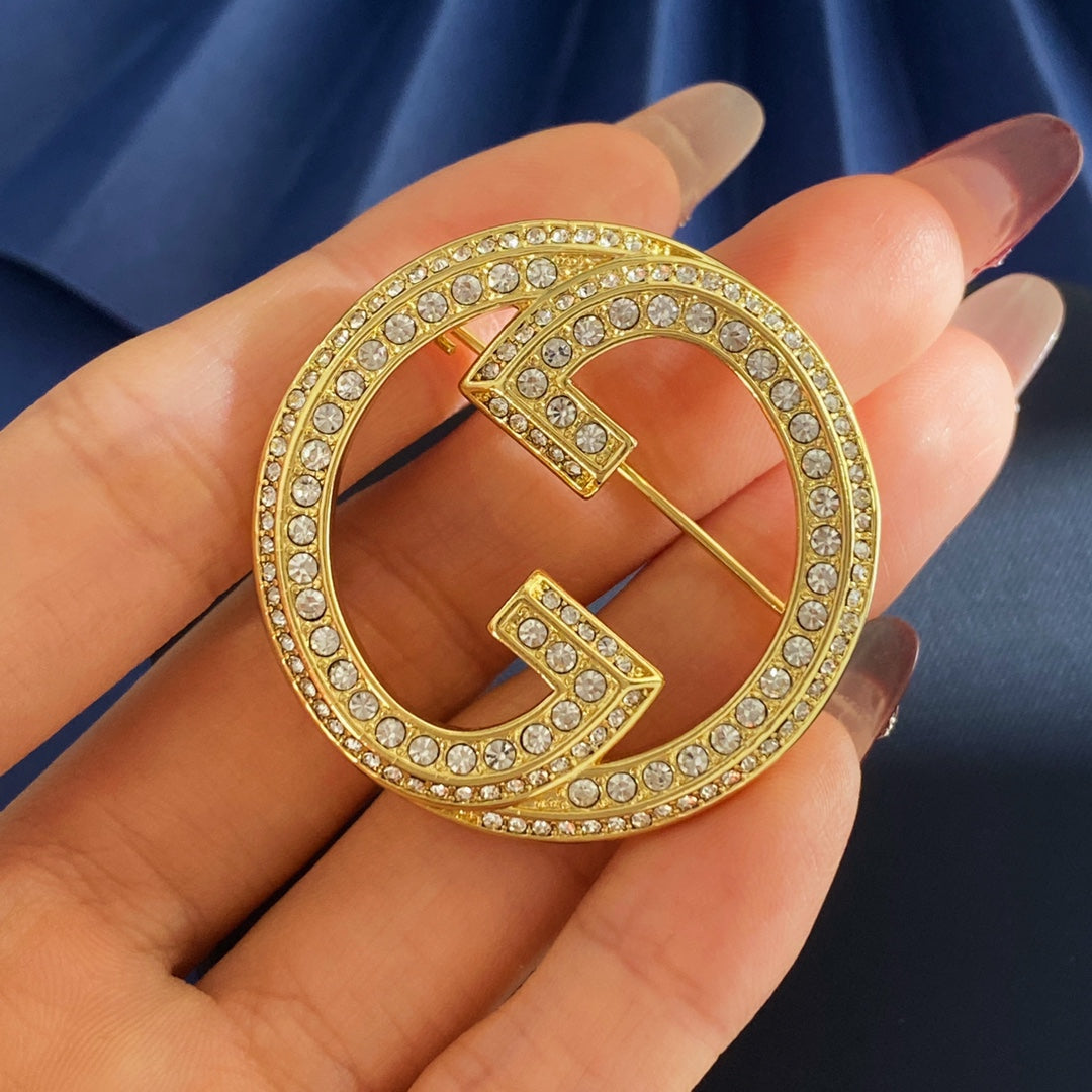 Martin Graham brooch in polished metal-tone – styled product view