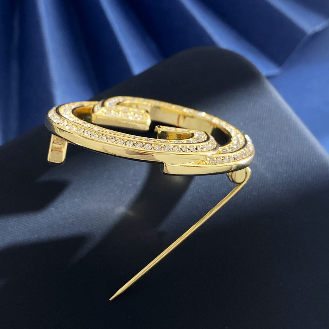 Martin Graham brooch in polished metal-tone – close-up detail