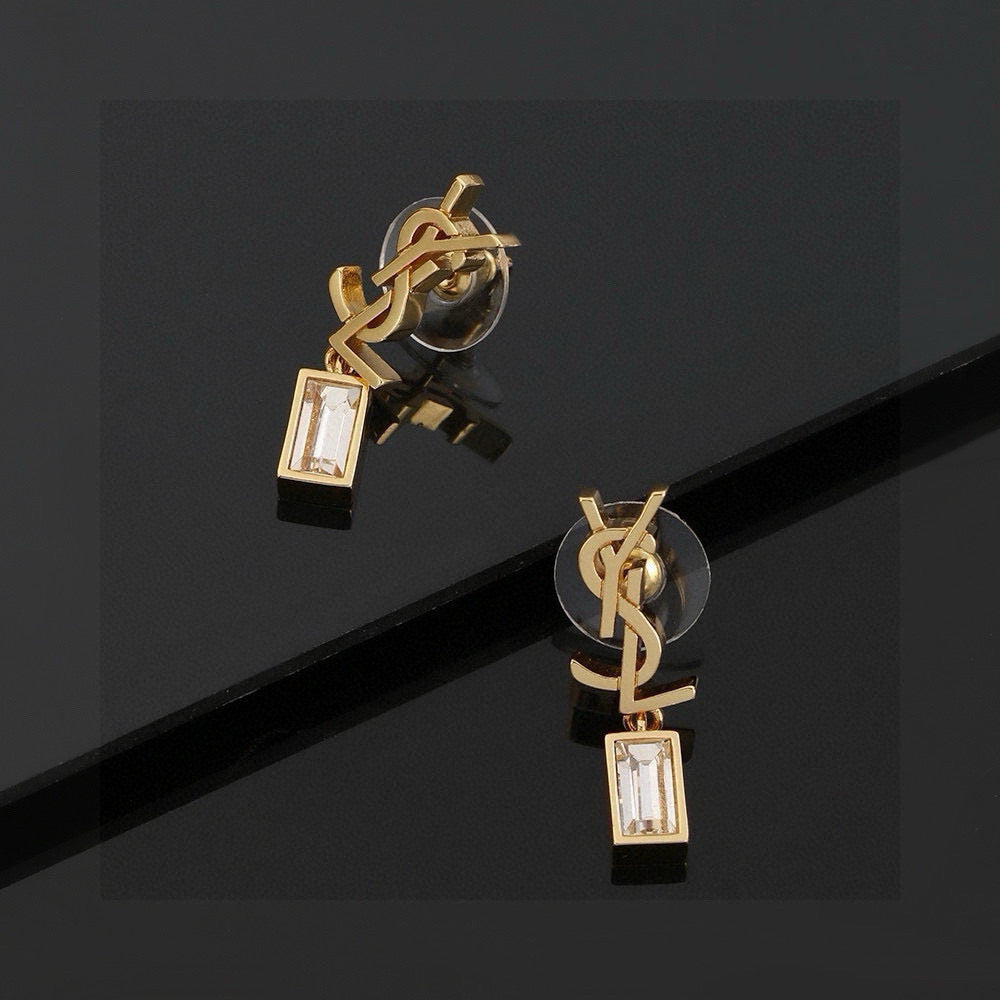 Martin Graham stud earrings in polished metal-tone – detail view