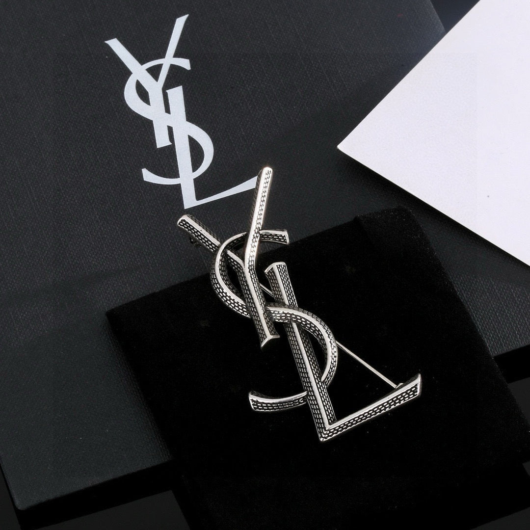 Martin Graham brooch in polished metal-tone – close-up detail