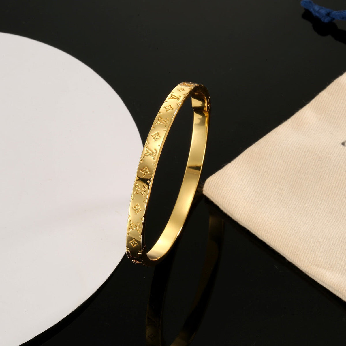Martin Graham bangle in polished metal-tone – styled product view