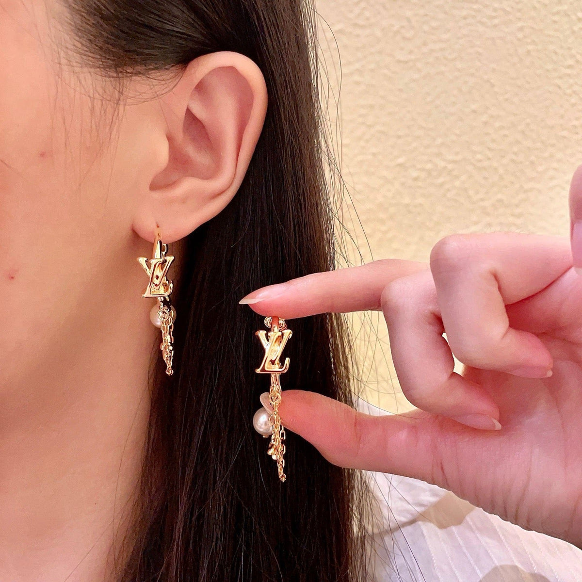 Martin Graham stud earrings in polished metal-tone – main product view