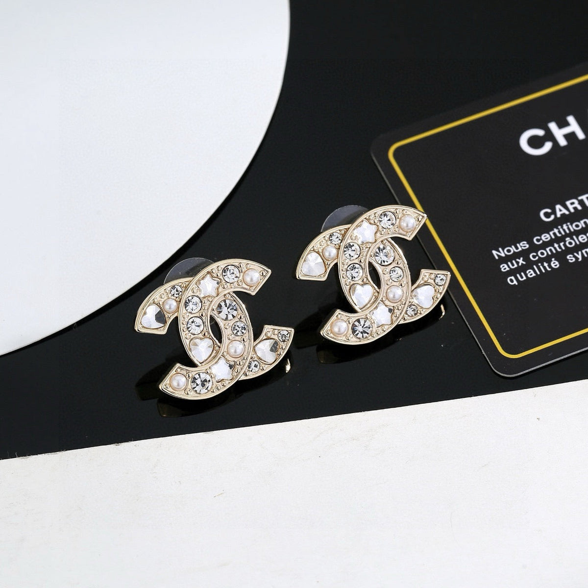 Martin Graham stud earrings in polished metal-tone – main product view