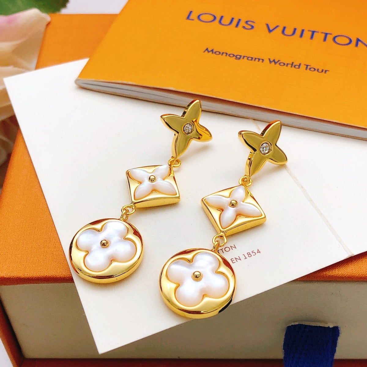 Martin Graham stud earrings in polished metal-tone – front product view