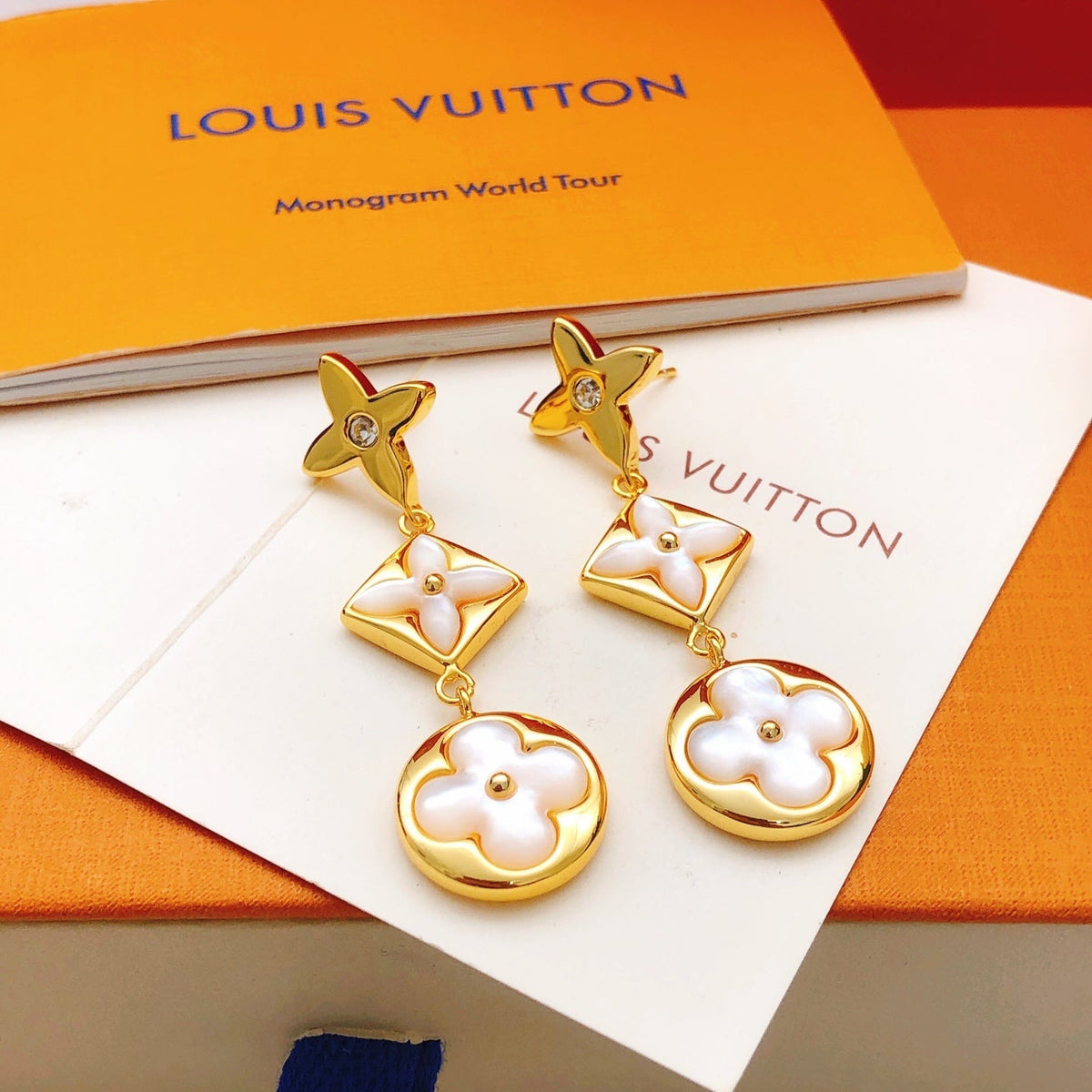 Martin Graham stud earrings in polished metal-tone – detail view