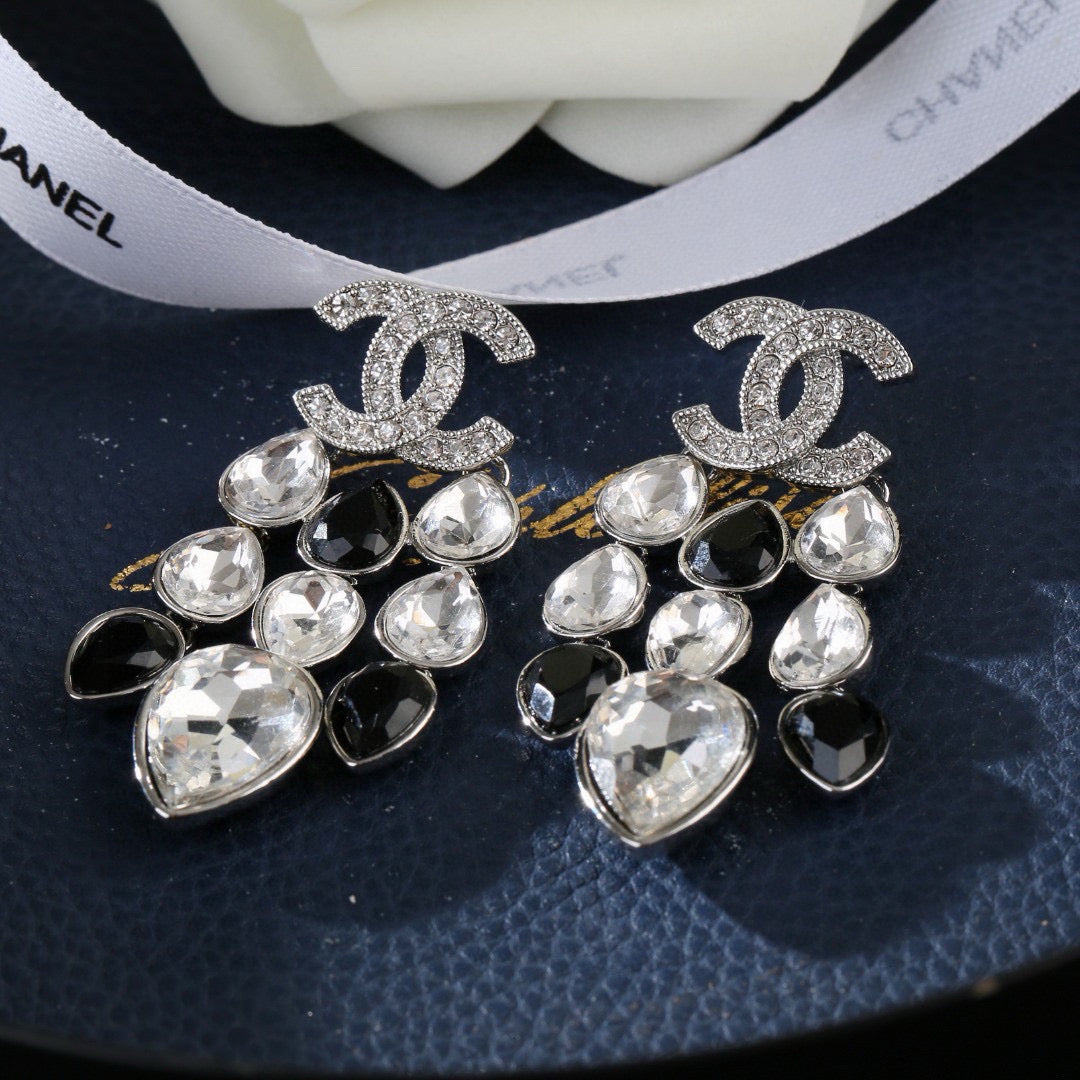 Martin Graham stud earrings in polished metal-tone – side detail