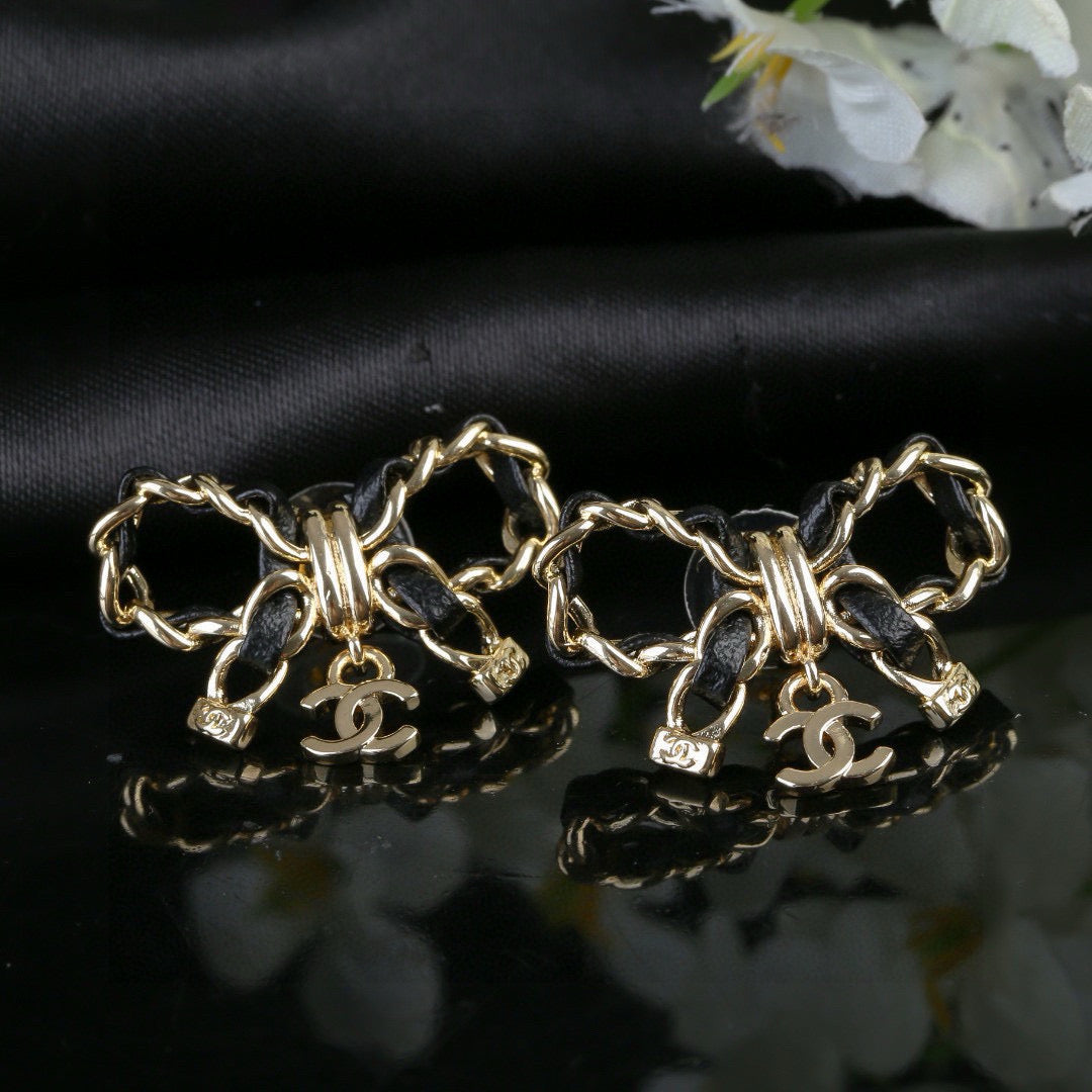 Martin Graham earrings in polished metal-tone – side detail