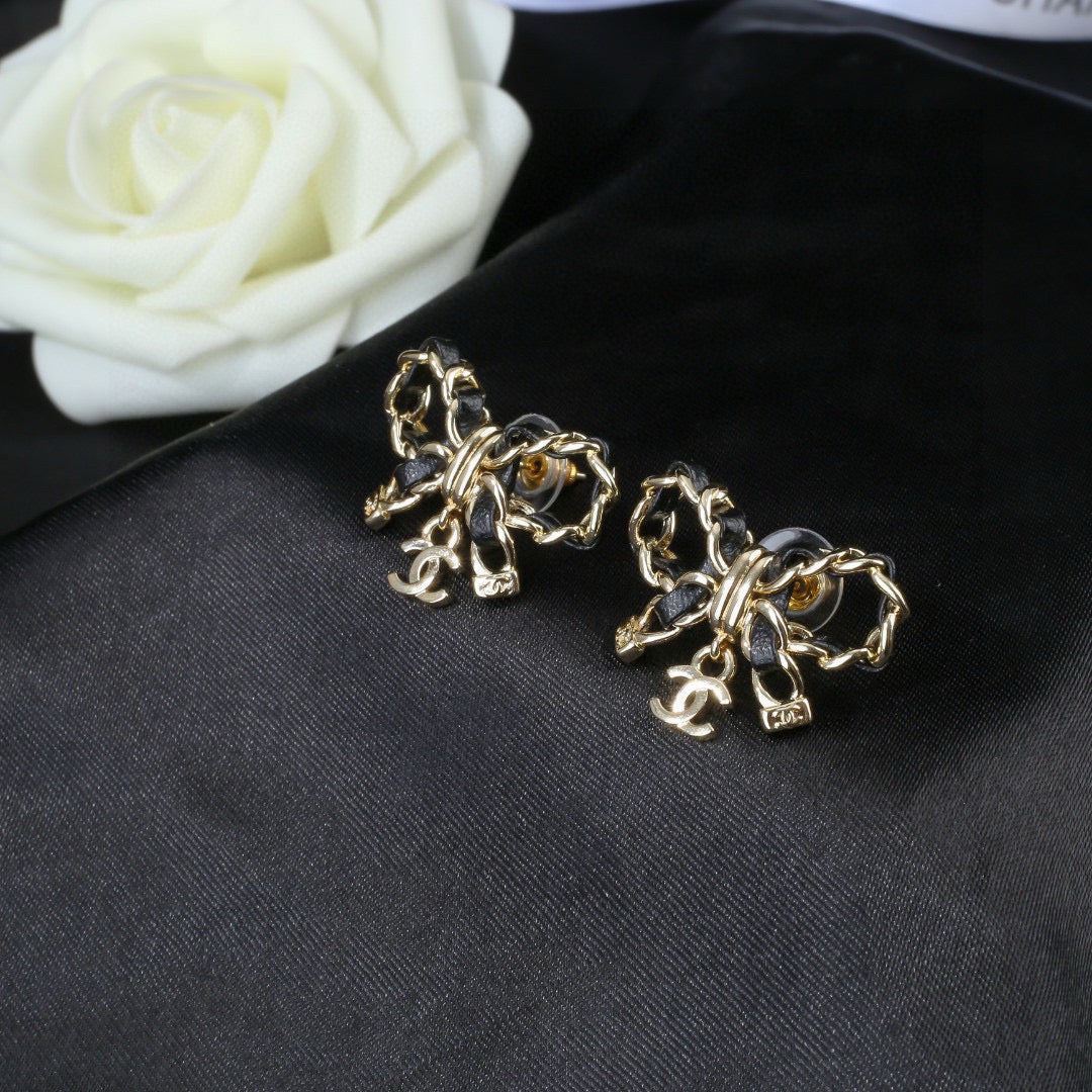 Martin Graham earrings in polished metal-tone – styled product view