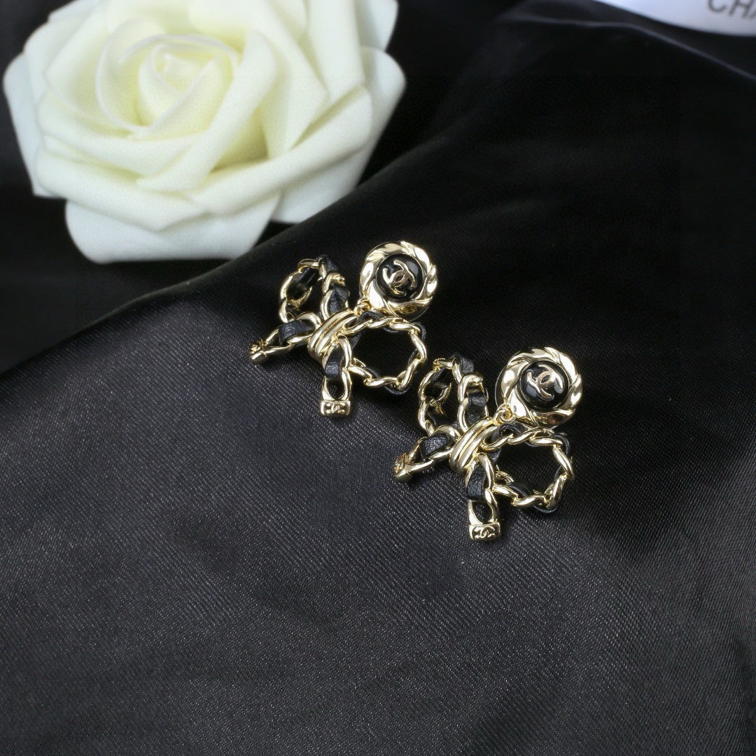 Martin Graham earrings in polished metal-tone – styled product view