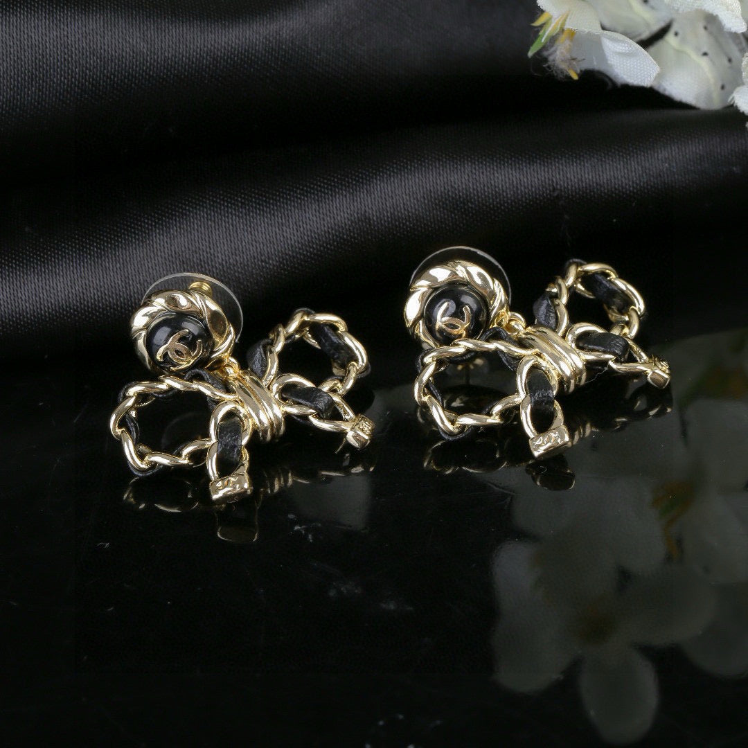Martin Graham earrings in polished metal-tone – side detail