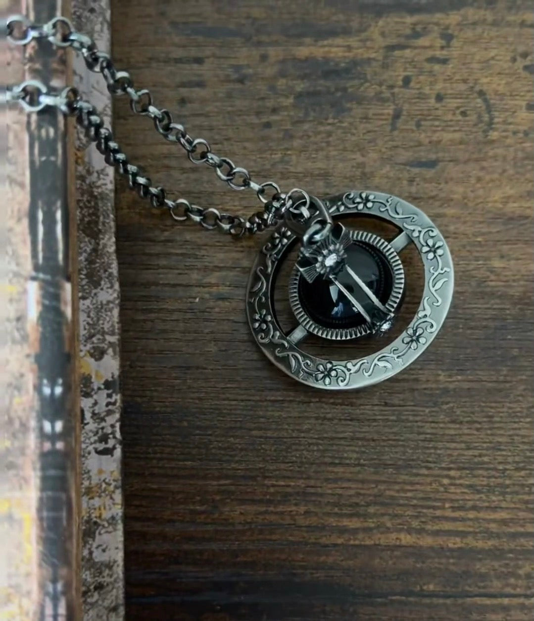 Martin Graham pendant necklace in polished metal-tone – close-up detail