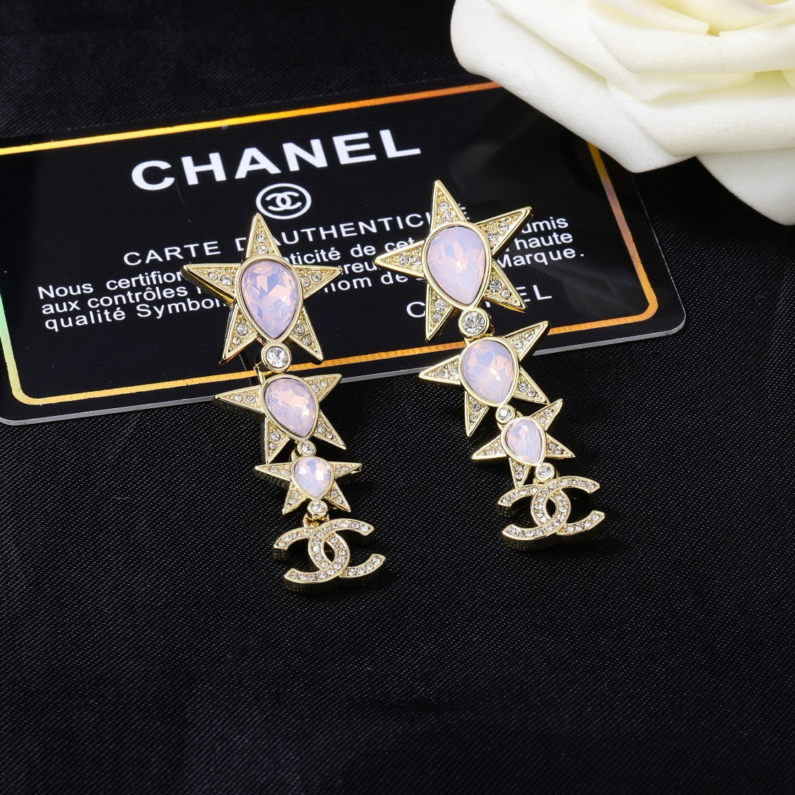 Martin Graham earrings in polished metal-tone – close-up detail