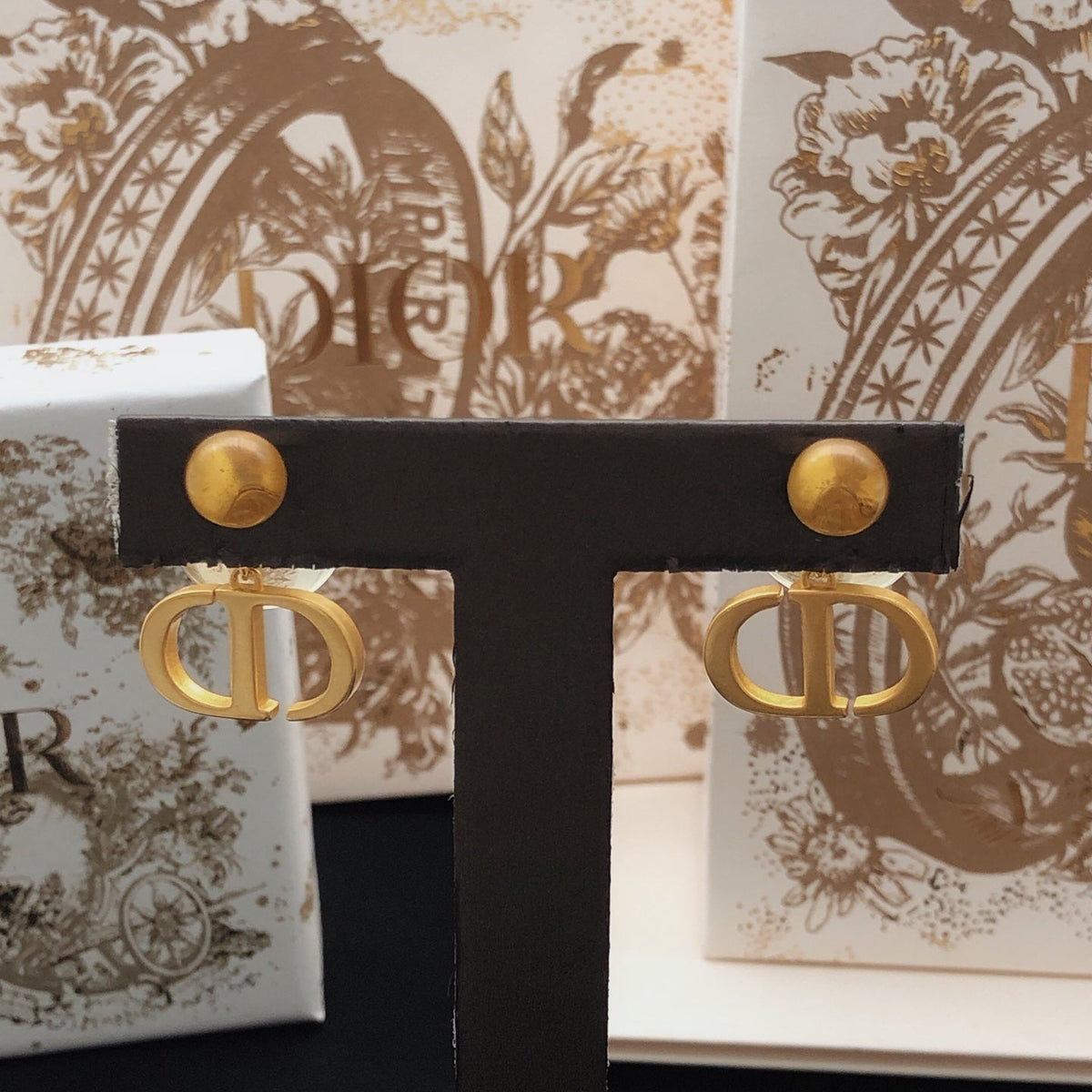 Martin Graham stud earrings in polished metal-tone