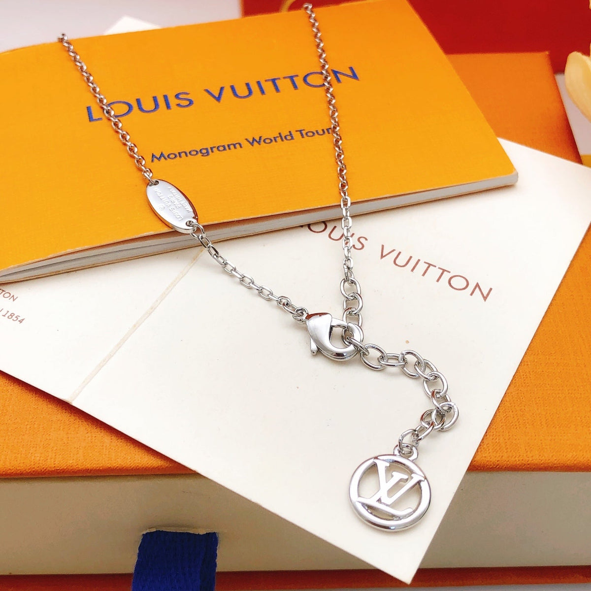 Martin Graham pendant necklace in polished metal-tone – side detail