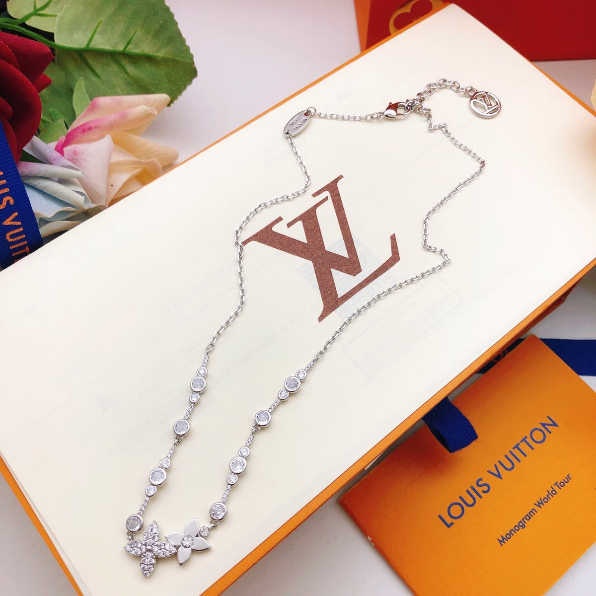 Martin Graham pendant necklace in polished metal-tone – close-up detail