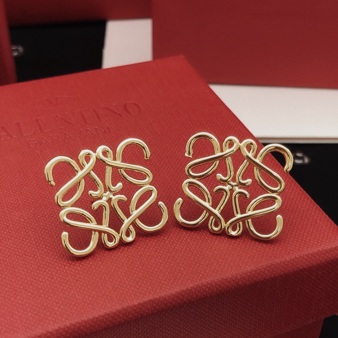 Martin Graham stud earrings in polished metal-tone – main product view