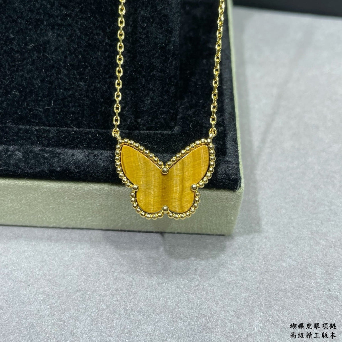 Martin Graham pendant necklace in polished metal-tone – front product view