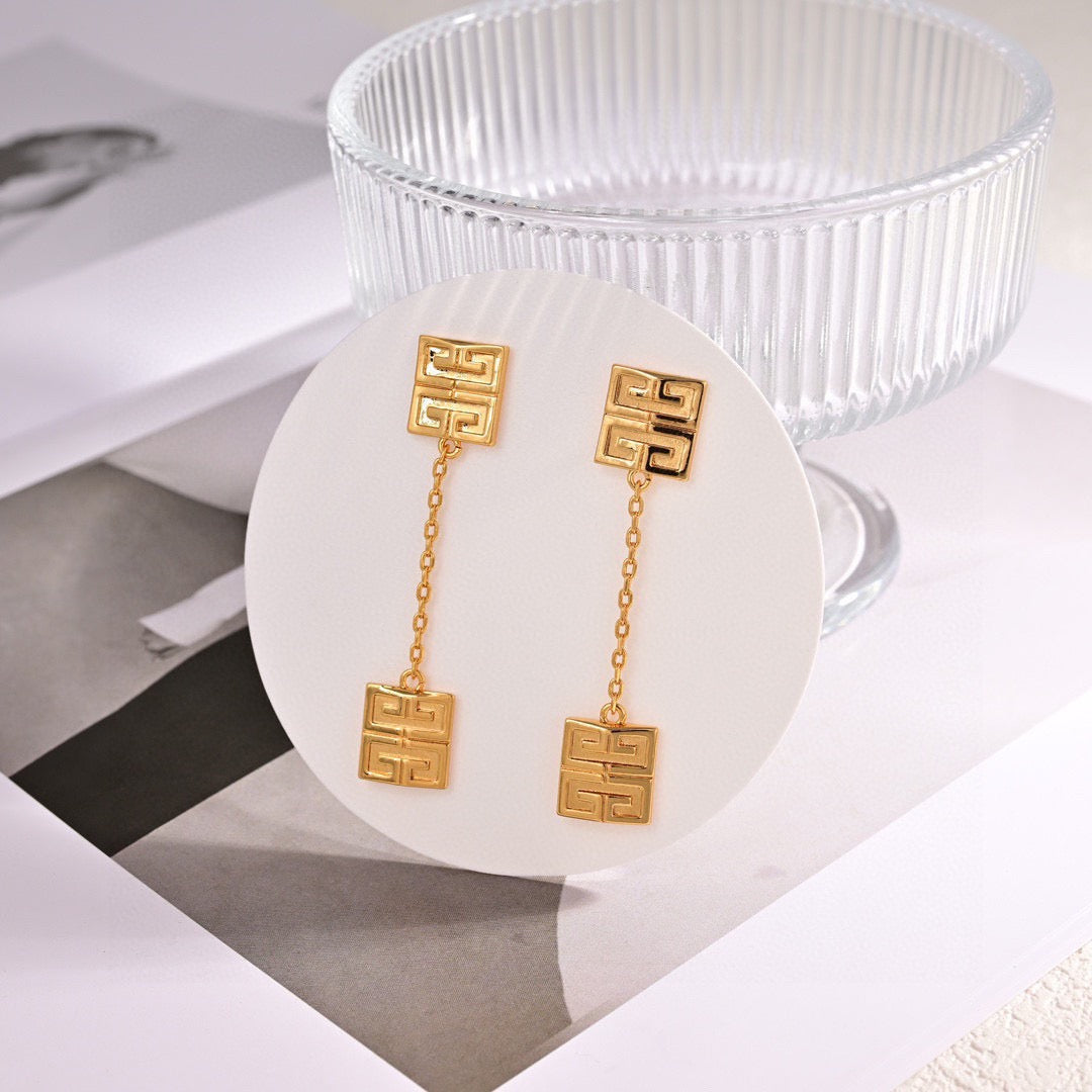 Martin Graham stud earrings in polished metal-tone – main product view