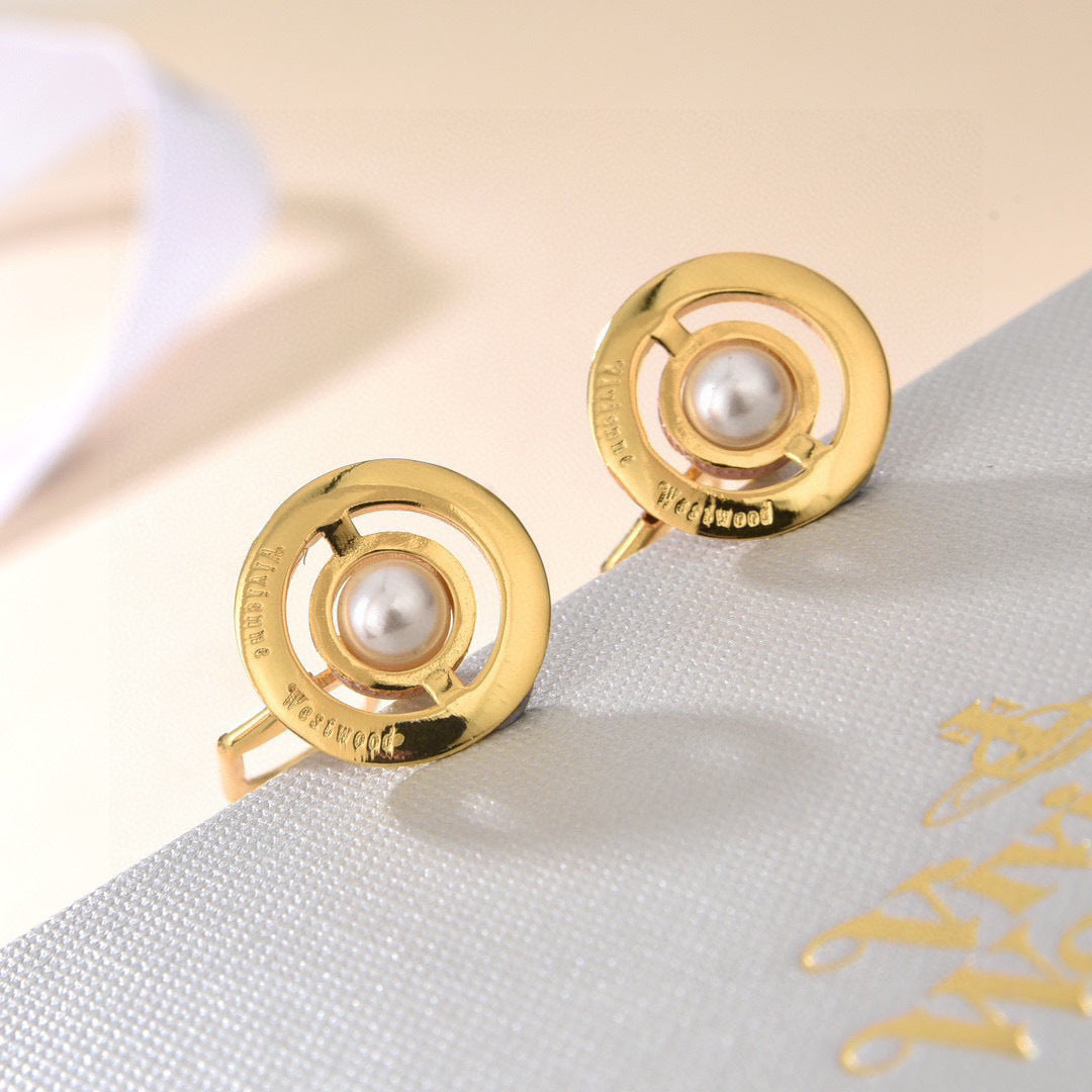 Martin Graham stud earrings in polished metal-tone – front product view