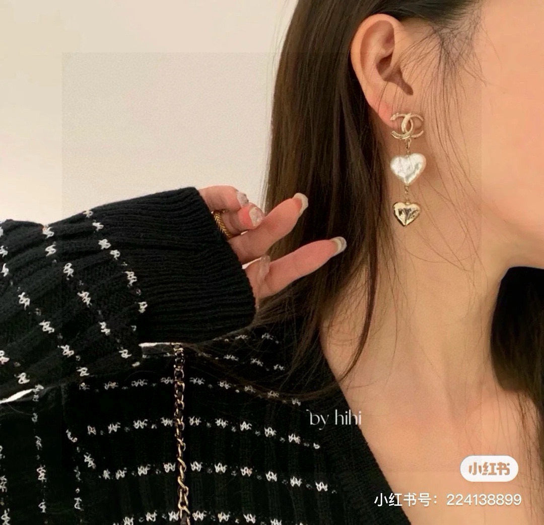 Martin Graham stud earrings in polished metal-tone – main product view