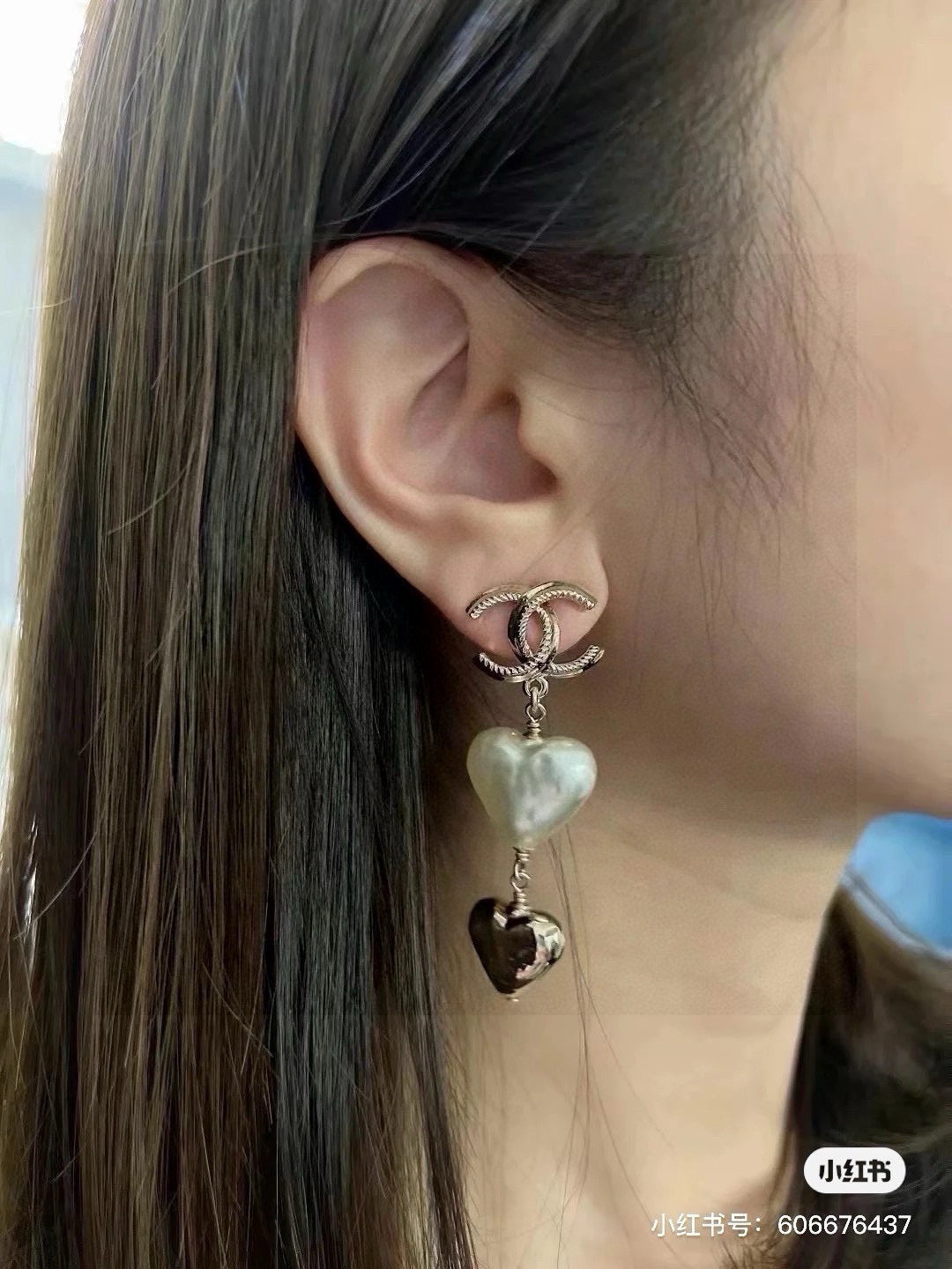 Martin Graham stud earrings in polished metal-tone – detail view