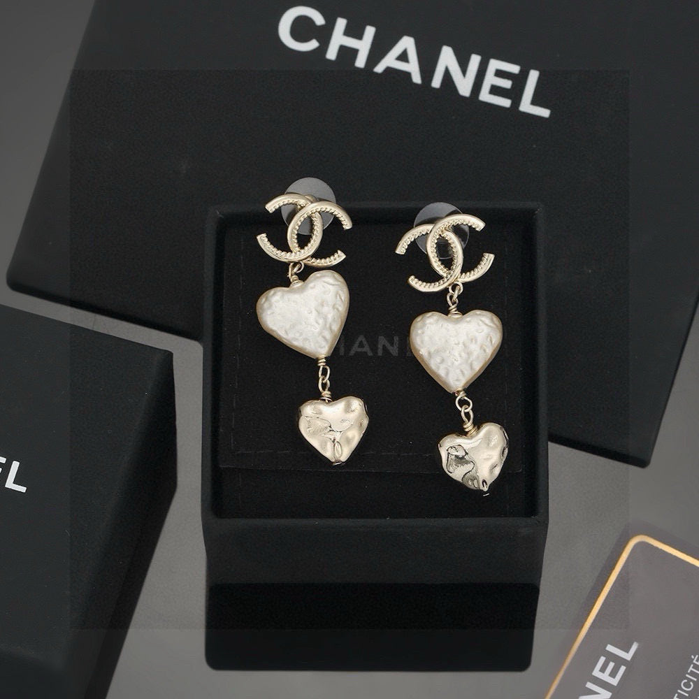 Martin Graham stud earrings in polished metal-tone – side detail