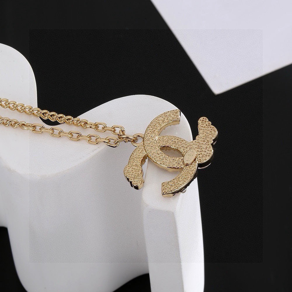Martin Graham pendant necklace in polished metal-tone – styled product view
