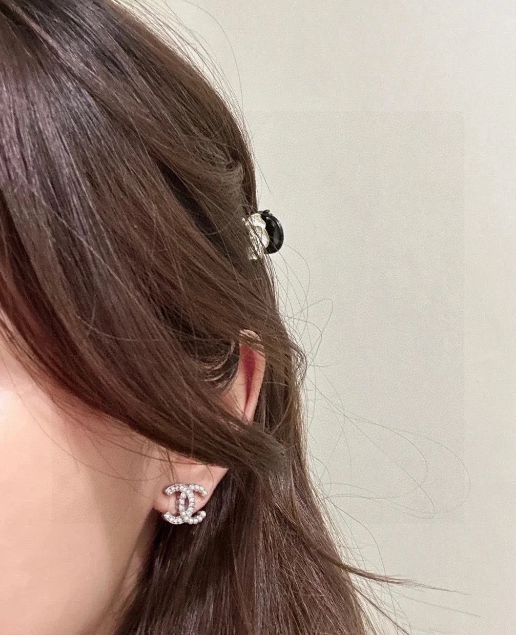 Martin Graham stud earrings in polished metal-tone – styled product view