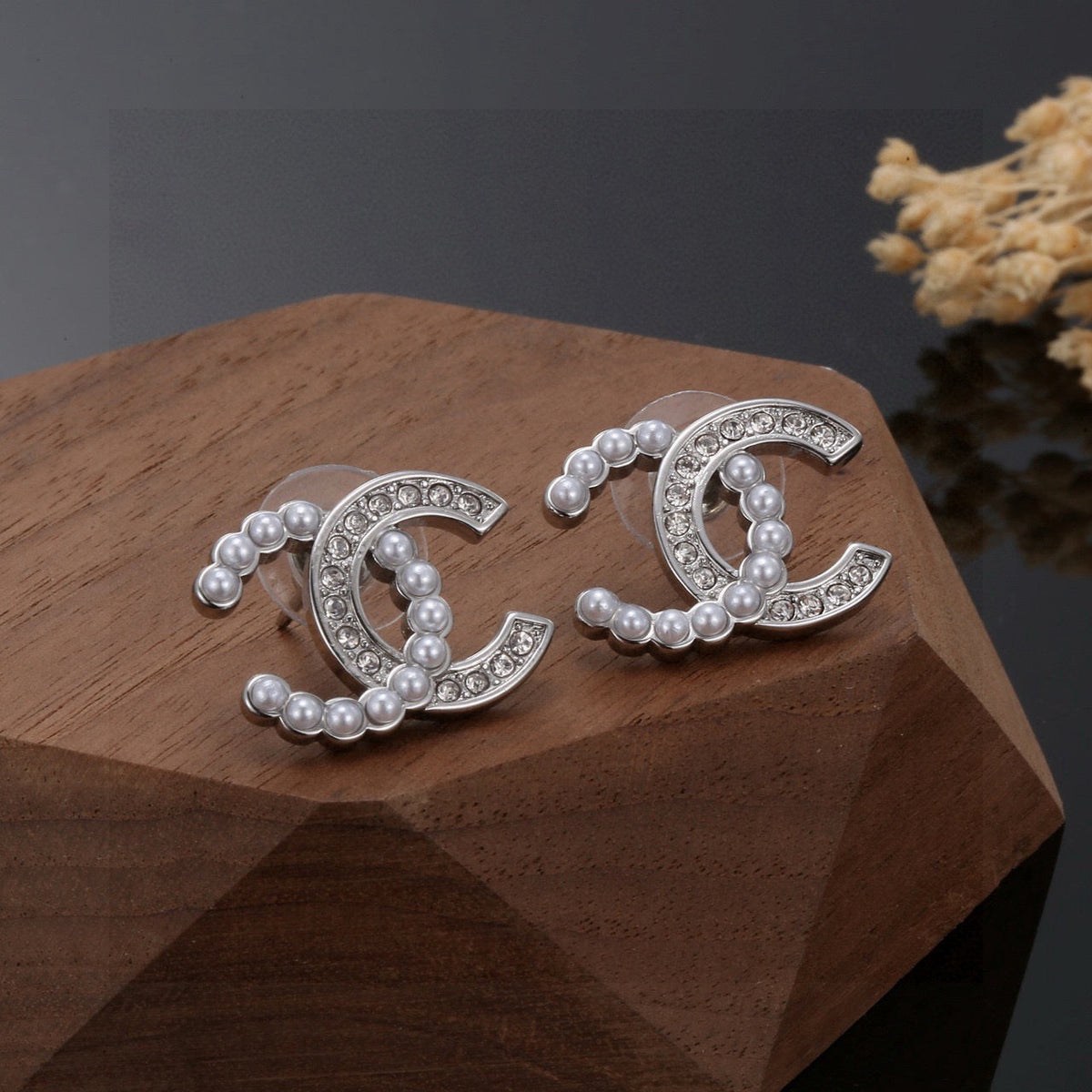 Martin Graham stud earrings in polished metal-tone – front product view