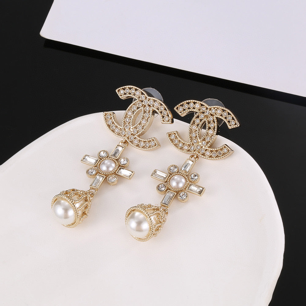 Martin Graham stud earrings in polished metal-tone – main product view